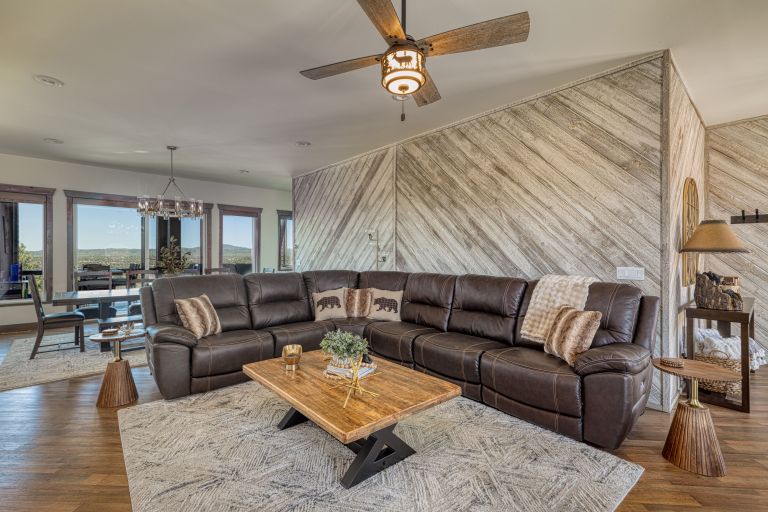 Dining and Living Room area for large group stays at The Lazy Bear Way in Show Low, AZ